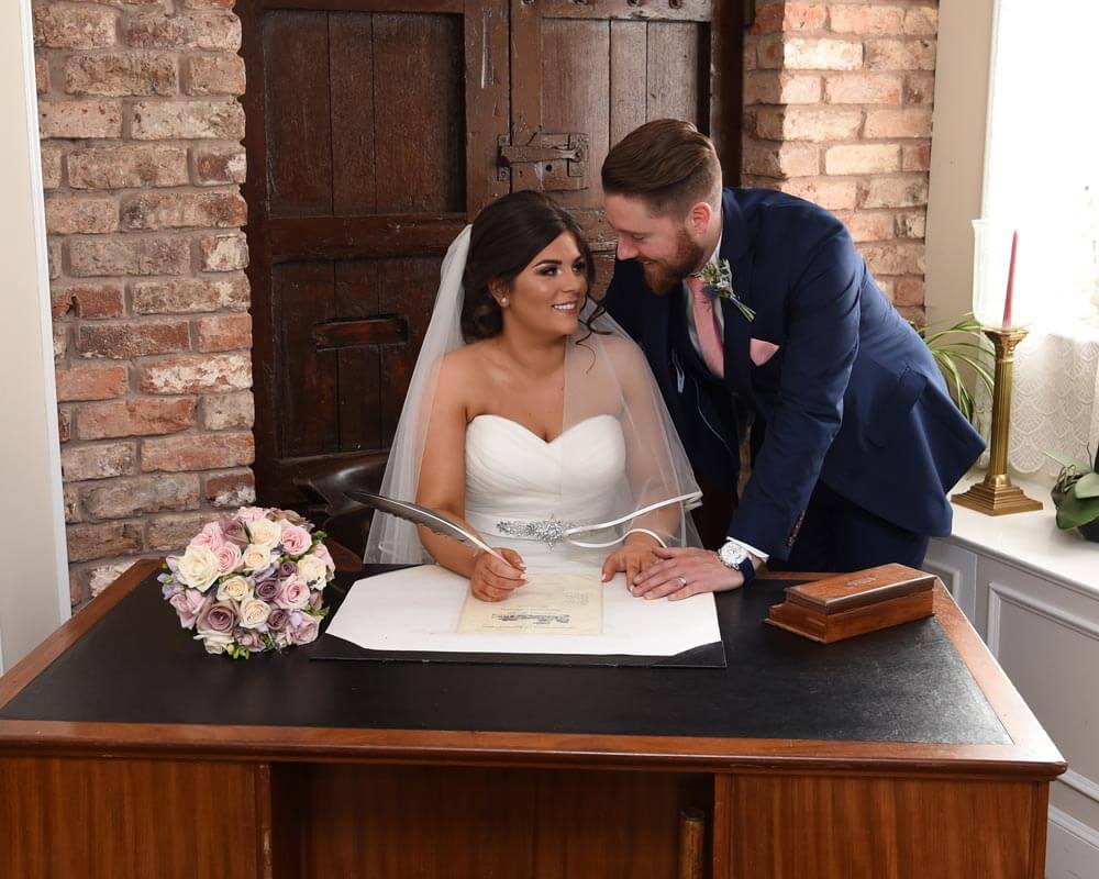 Wedding photo in the Rennison Room at the Famous Blacksmith Shop Gretna Green